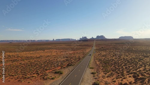 Immerse yourself in the stunning vistas of Monument Valley, Arizona, as our drone takes you on a breathtaking journey.
