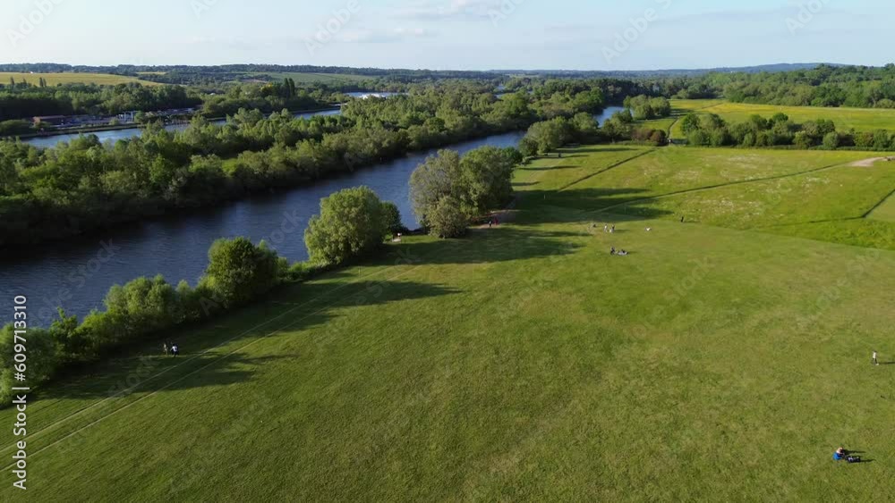 Reading, United Kingdom - A view along the river Thames at Thames Valley Park Reading, United Kingdom - A view along the river Thames at Thames Valley Park