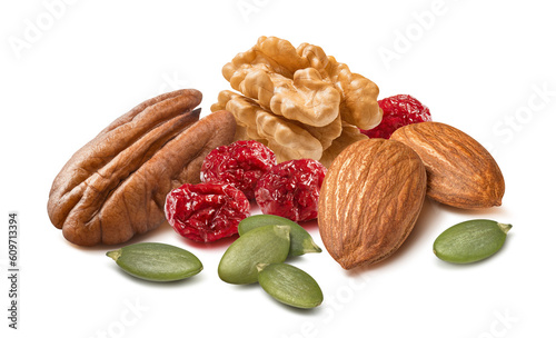 Pecan, walnut, almonds, green pumpkin seeds and dried cranberry isolated on white background. Nut and berries mix