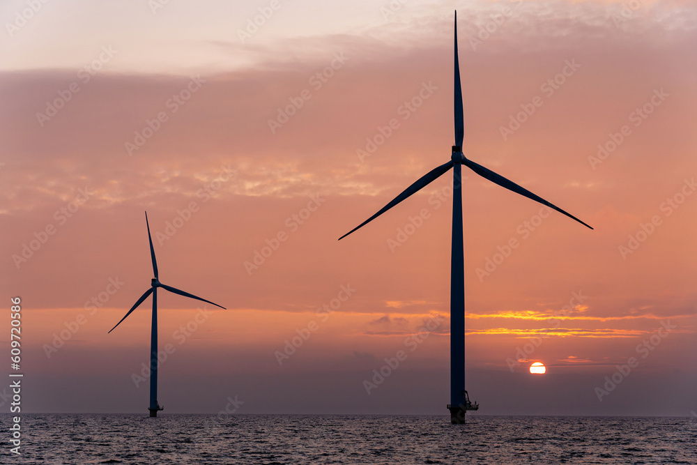 offshore wind farm at sunset