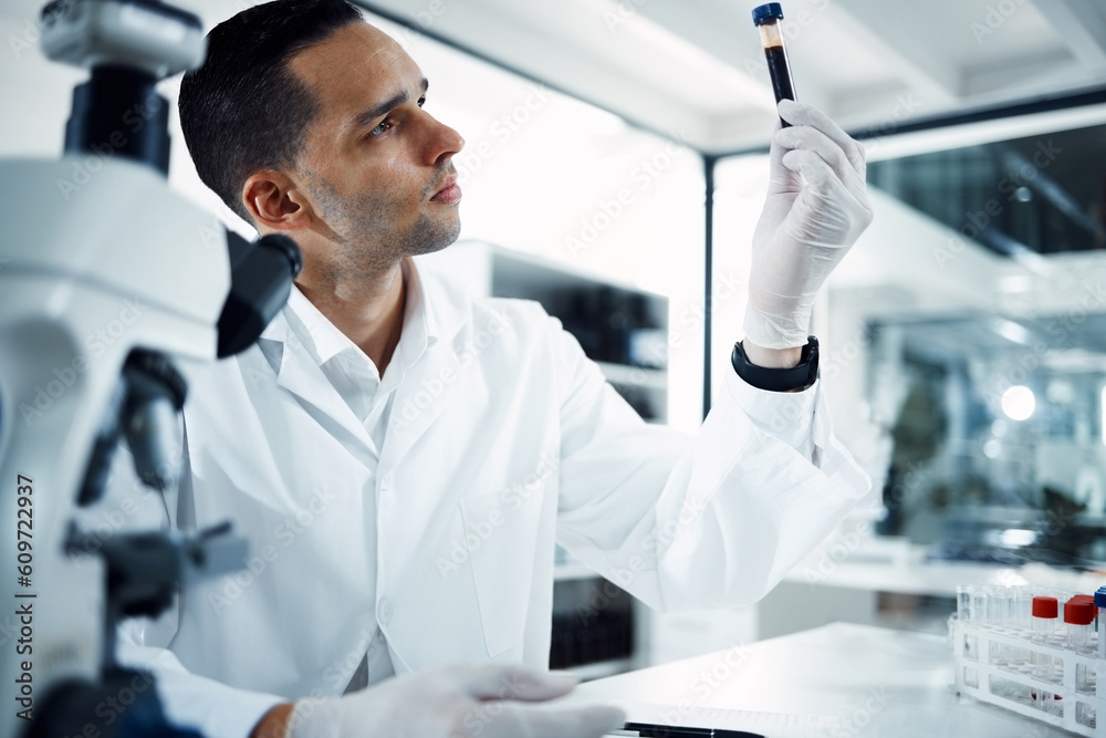 Man, scientist and analysis of blood sample in test tube, DNA and science experiment in laboratory. Male doctor with gloves, study liquid with forensics, scientific innovation and medical research Man, scientist and analysis of blood sample in test tube, DNA and science experiment in laboratory. Male doctor with gloves, study liquid with forensics, scientific innovation and medical research