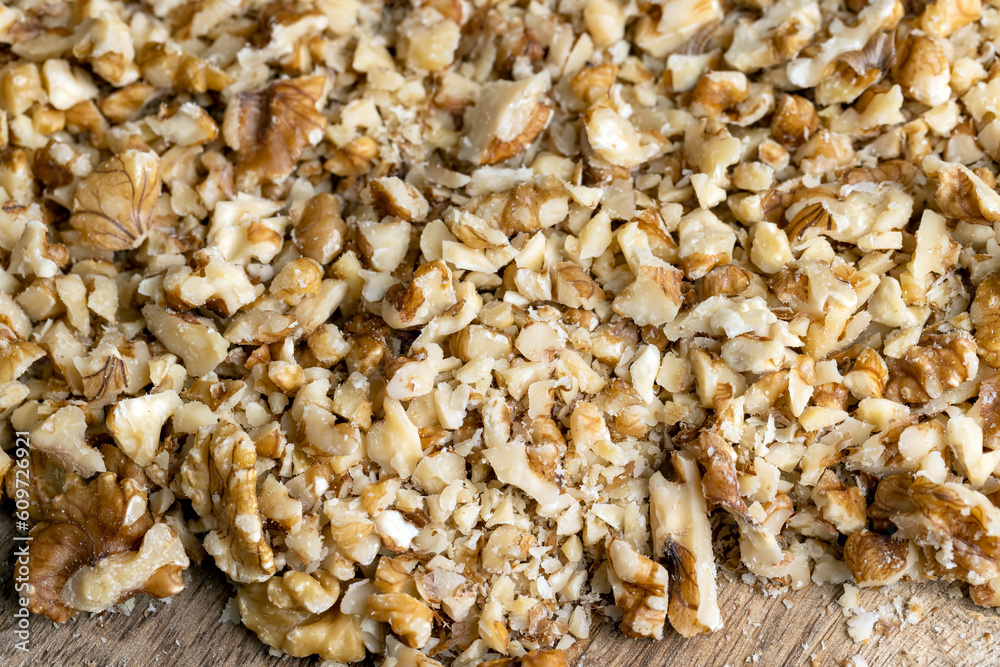 Walnut kernel on the kitchen table during cooking Walnut kernel on the kitchen table during cooking
