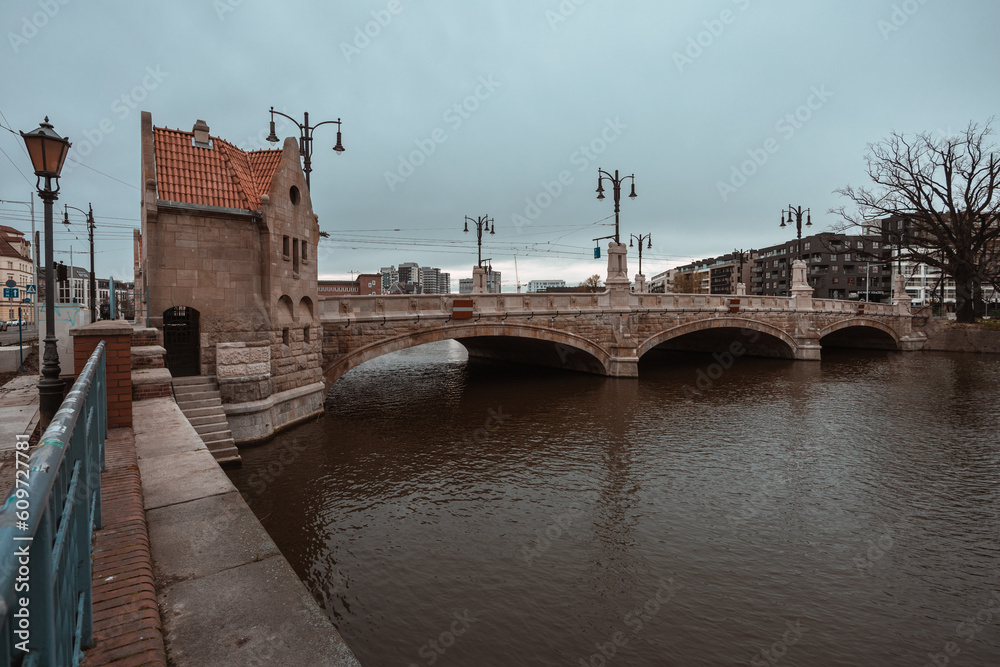 Obraz premium Wroclaw, Pomorski bridge, street near the river