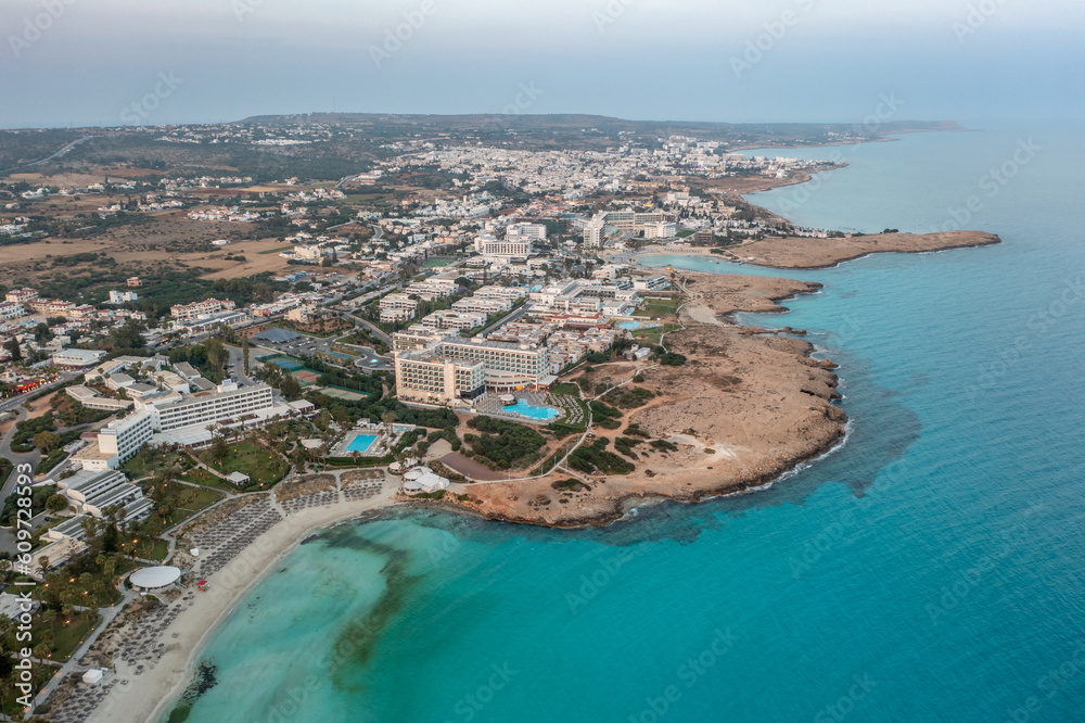Cyprus -Nissi Beach in Ayia Napa, clean aerial photo of famous tourist beach in Cyprus, the place is a known destination on island and is formed from a smaller island just near the main shore