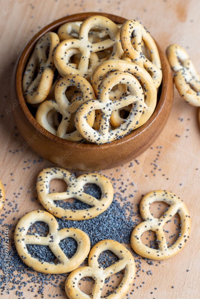 Poppy seed coating dried bagels on the table Poppy seed coating dried bagels on the table
