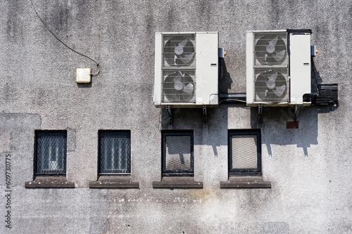 Heat pump condenser units for heating and cooling modern building