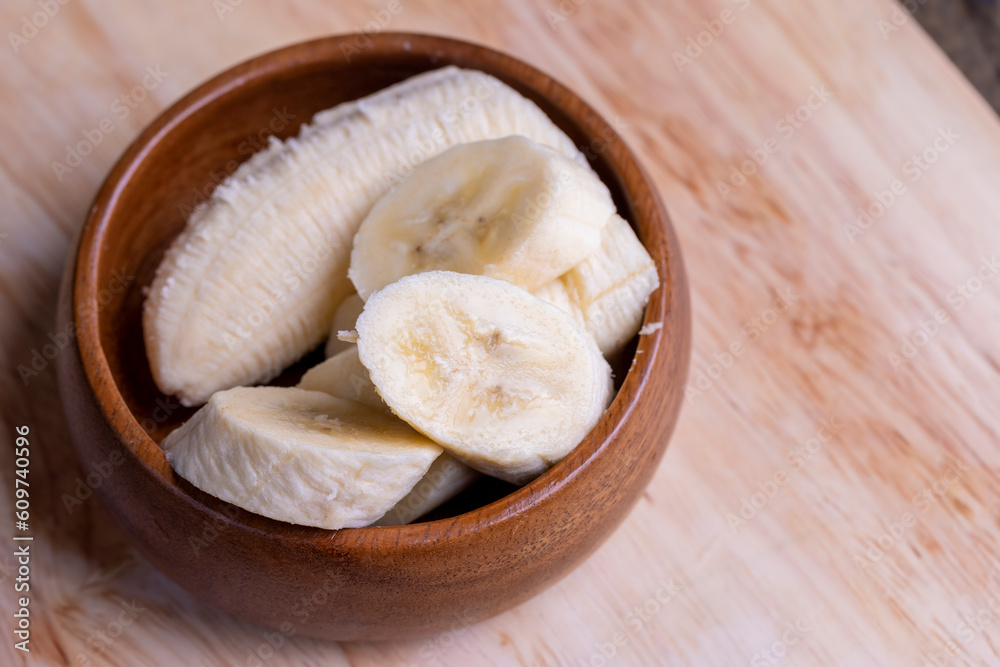 Sliced ripe banana on a cutting board Sliced ripe banana on a cutting board
