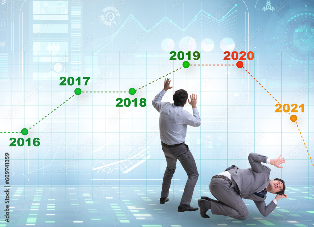 Businessman in market crash concept Businessman in market crash concept