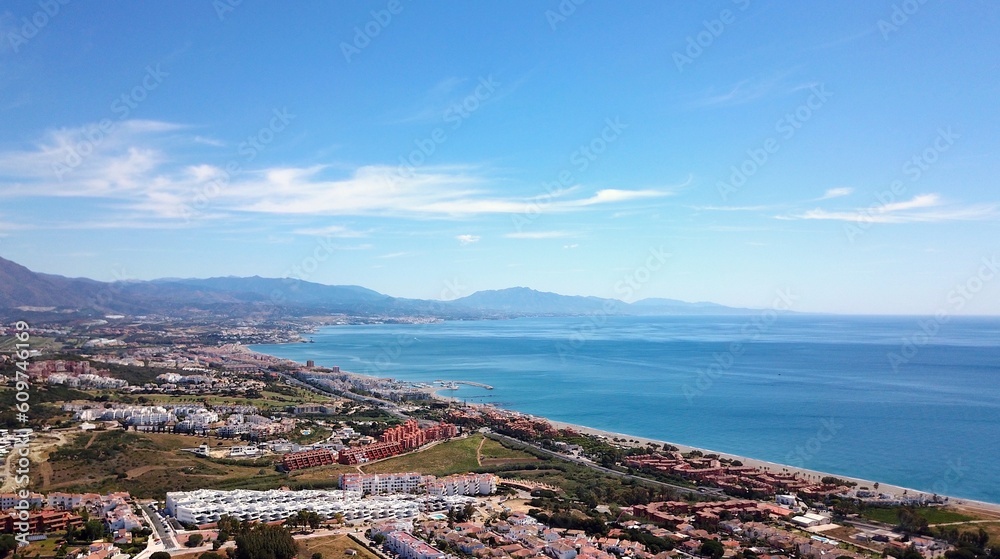 aerial view overlooking Manilva coast holiday homes and beach on the Costa del Sol as well as Duquesa Port on the Mediterranean Sea, Andalusia, Estepona, Marbella, Manilva, Malaga, Spain