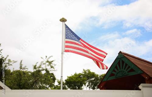 US flag: a symbol of patriotism, national identity, freedom, and the commemoration of American holidays like Memorial Day and July Fourth