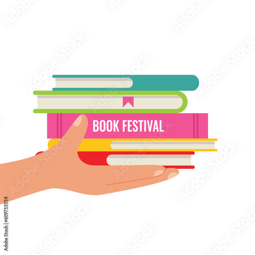 Hand holding a stack of colorful books. Vector illustration.
