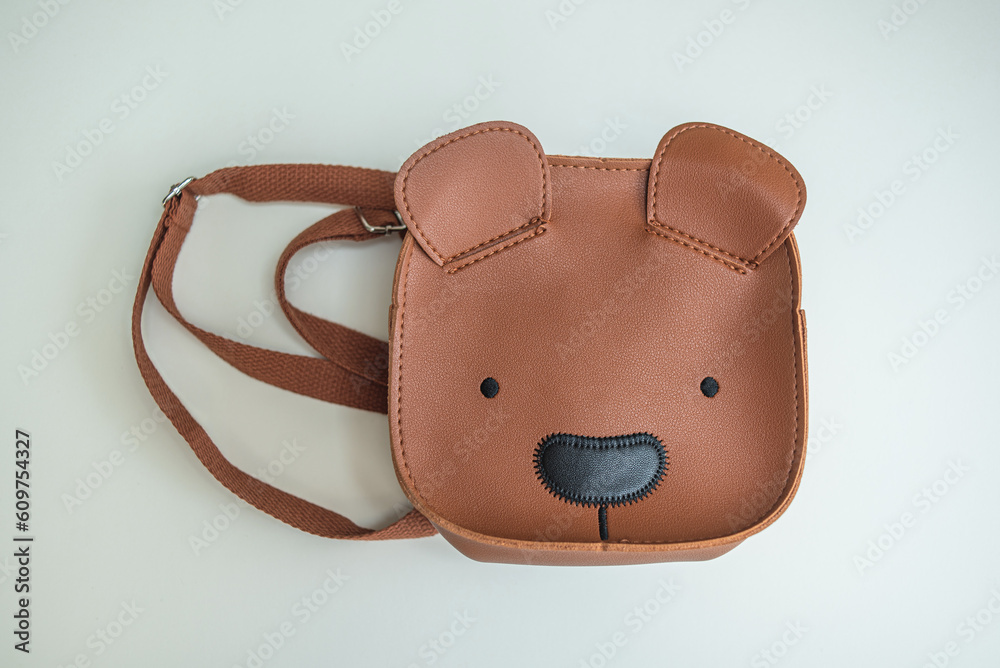 Isolated teddy bear backpack on a white background