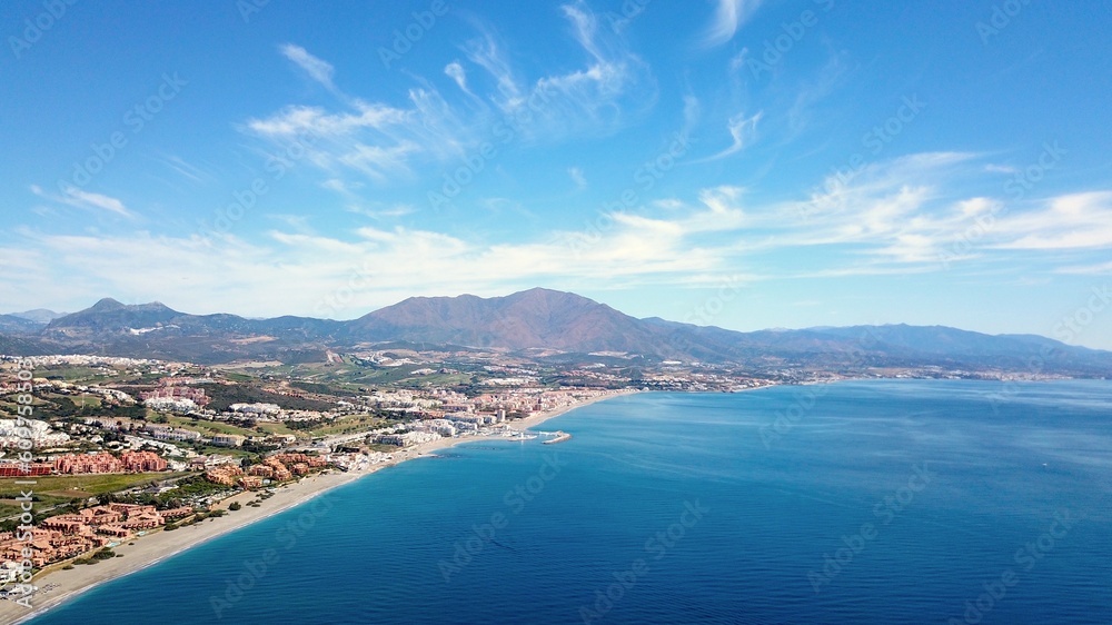 aerial view overlooking Manilva and Duquesa Port on the Mediterranean Sea and mountains of the Sierra Bermeja in the backgrou, Andalusia, Estepona, Marbella, Manilva, Malaga, Spain