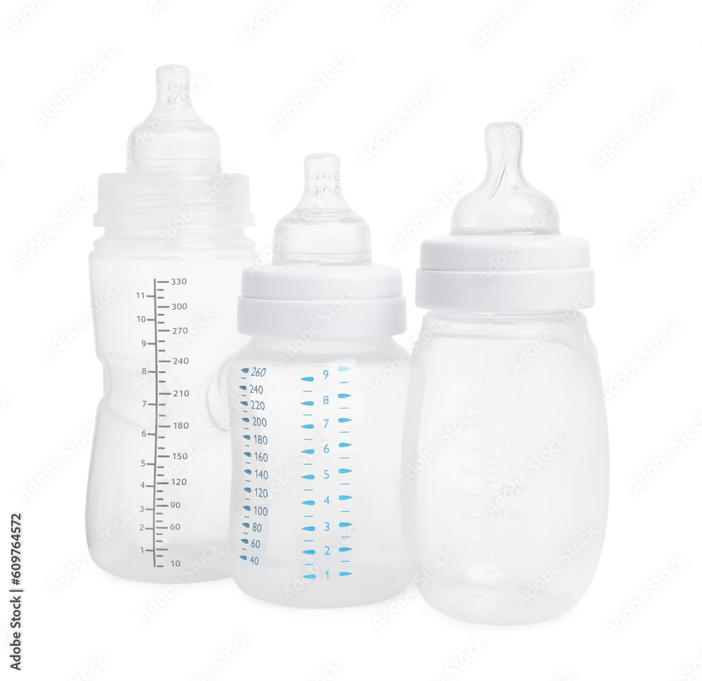 Three empty feeding bottles for baby milk on white background Three empty feeding bottles for baby milk on white background