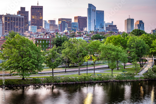 The city of Boston in the summer sun at sunrise at Backbay neighborhood with the Charles River and its mix of contemporary and historic buildings.
