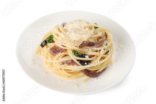 Plate of delicious pasta with anchovies, olives and parmesan cheese isolated on white