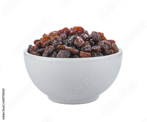 Black raisin on white bowl isolated on transparent png