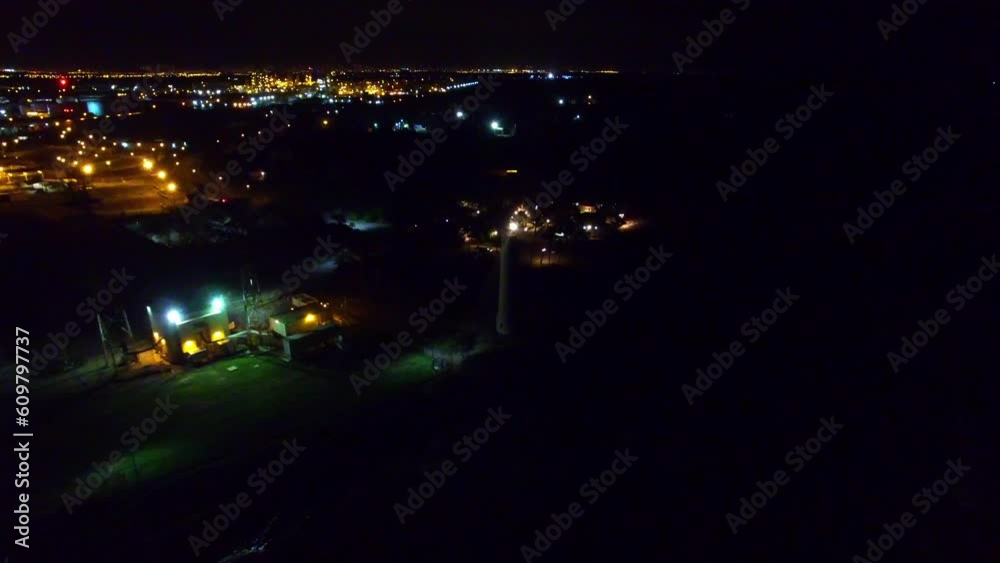 Aerial Shot Of Illuminated Light On Lighthouse At Night, Drone Ascending Backward Over Sea Against Sky - Oahu, Hawaii Aerial Shot Of Illuminated Light On Lighthouse At Night, Drone Ascending Backward Over Sea Against Sky - Oahu, Hawaii