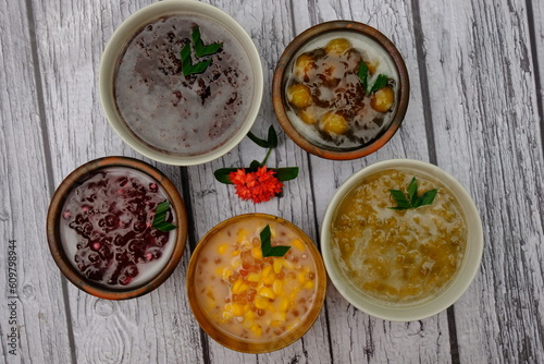 Assorted of Indonesian traditional porridge, such as bubur kacang ijo (mung bean), bubur jagung Mutiara (corn), bubur ketan hitam (black rice), bubur biji salak (sweet potatoe). This meal is popular.