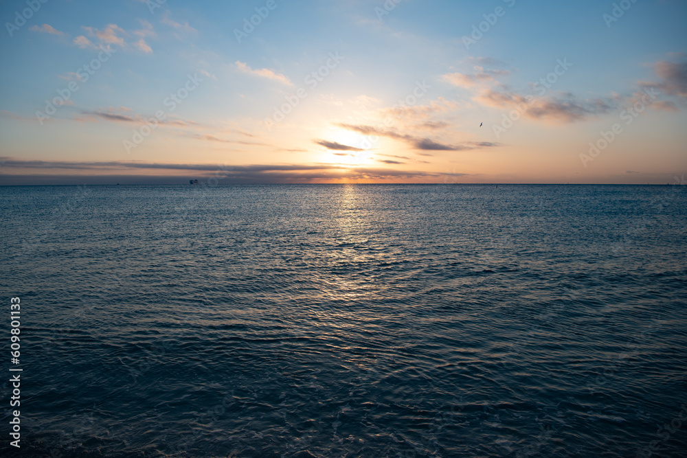 beautiful morning skyscape with sea water on the summer beach