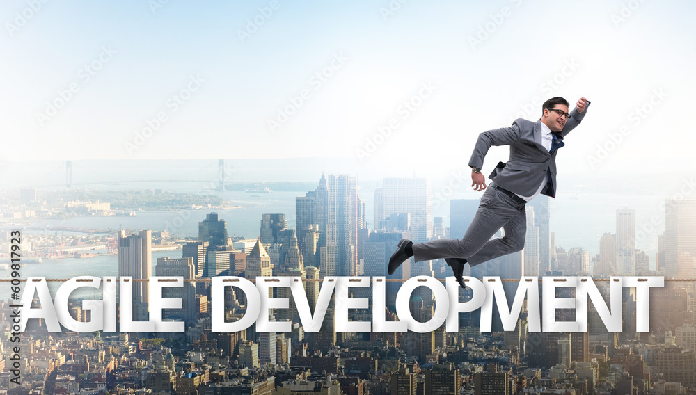 Agile transformation concept with businessman walking on tight r Agile transformation concept with businessman walking on tight r