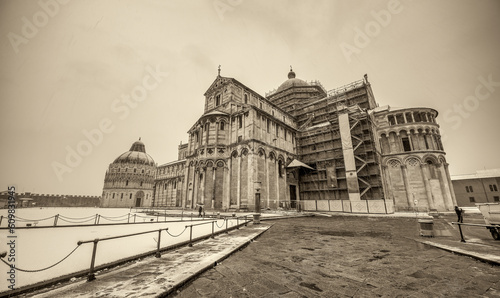 Pisa under the snow. Famous landmarks and monuments of Field of Miracles after a snowstorm