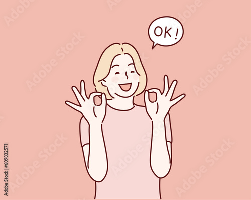 woman is showing a gesture Okay, ok. Hand drawn style vector design illustrations.