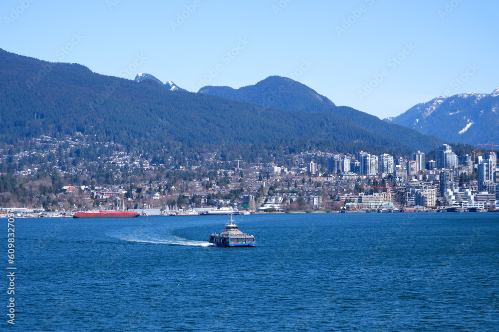 how to cross to the other side in Vancouver sea bass sea bus sailing across the Pacific Ocean latest technology skyscrapers beautiful sunny weather Vancouver Canada British Columbia 2023