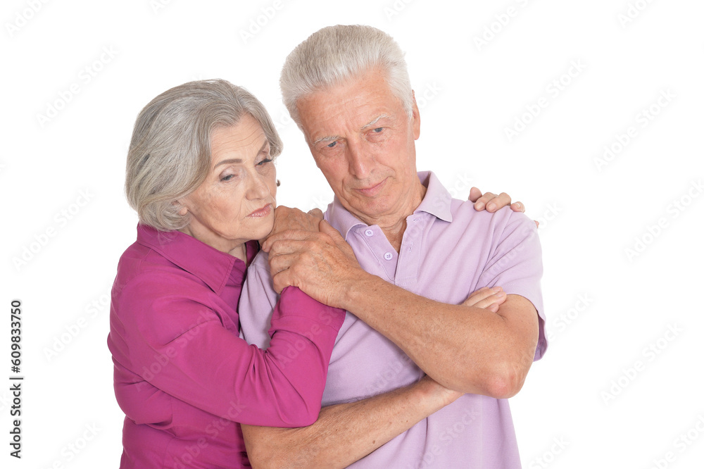 Portrait of sad senior couple isolated