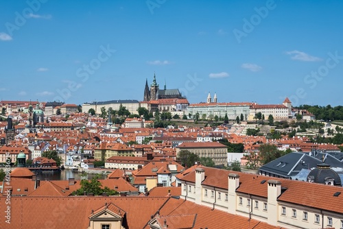 Cityscape with Prague Castle and roofs of buildings in the historic center of Prague, Czech Republic