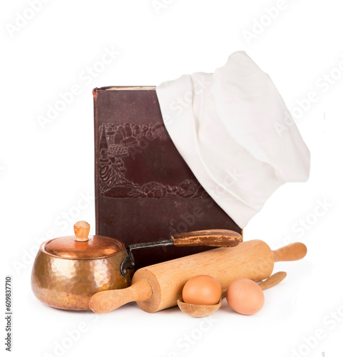 Chef's hat with battledore and cook book