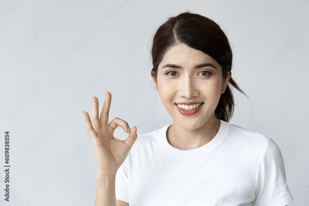 Woman giving approving ok, all correct gesture Woman giving approving ok, all correct gesture