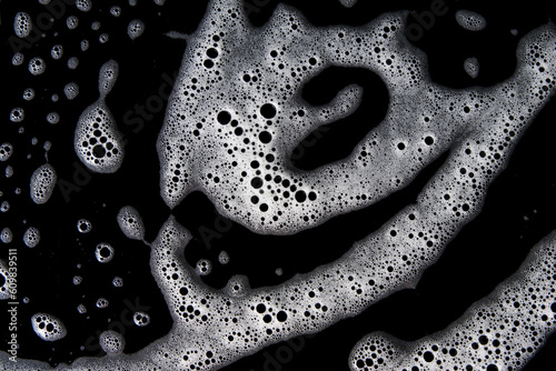 Abstract background white soapy foam texture. Shampoo foam with bubbles