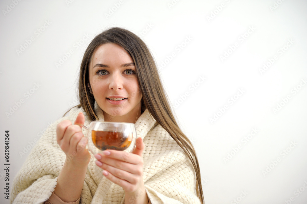 beautiful young woman with teacup wearing a sweater. High quality photo beautiful young woman with teacup wearing a sweater. High quality photo