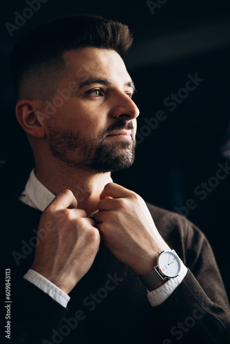Young man in classy outfit isolated in studio