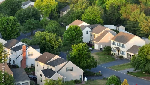 Wallpaper Mural Neighborhood in American suburbs. Aerial view of houses with evening sunlight. Long aerial zoom. Torontodigital.ca