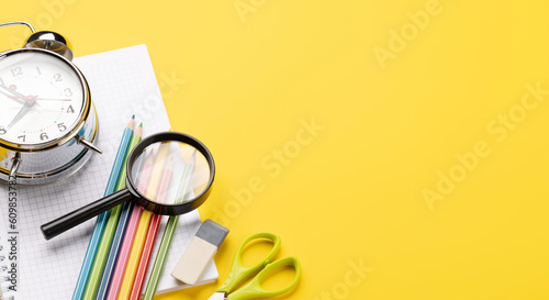 School supplies and stationery on yellow