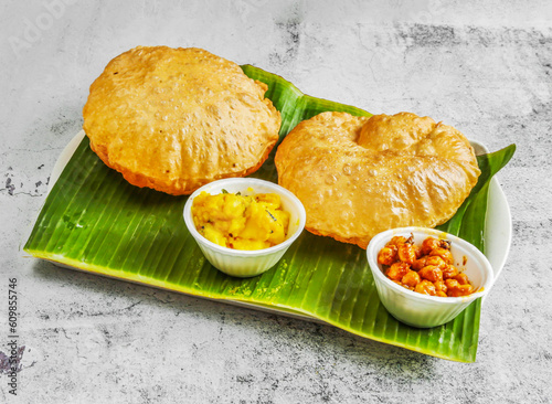 Obraz na plátně poori set or puri with chnnay and veg curry with chutney, raita and sauce served