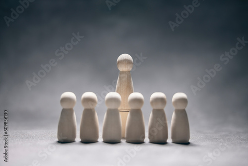 Leadership presentation business team with one person standing out from the crowd photo
