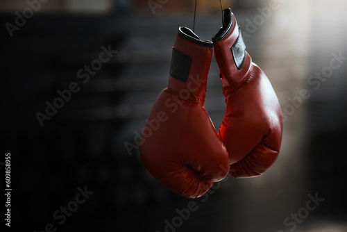 Empty, gym and boxing gloves for fitness, sports and training, wellness and healthy lifestyle. Protective, glove and fighting sport equipment at a health center for workout, endurance and challenge