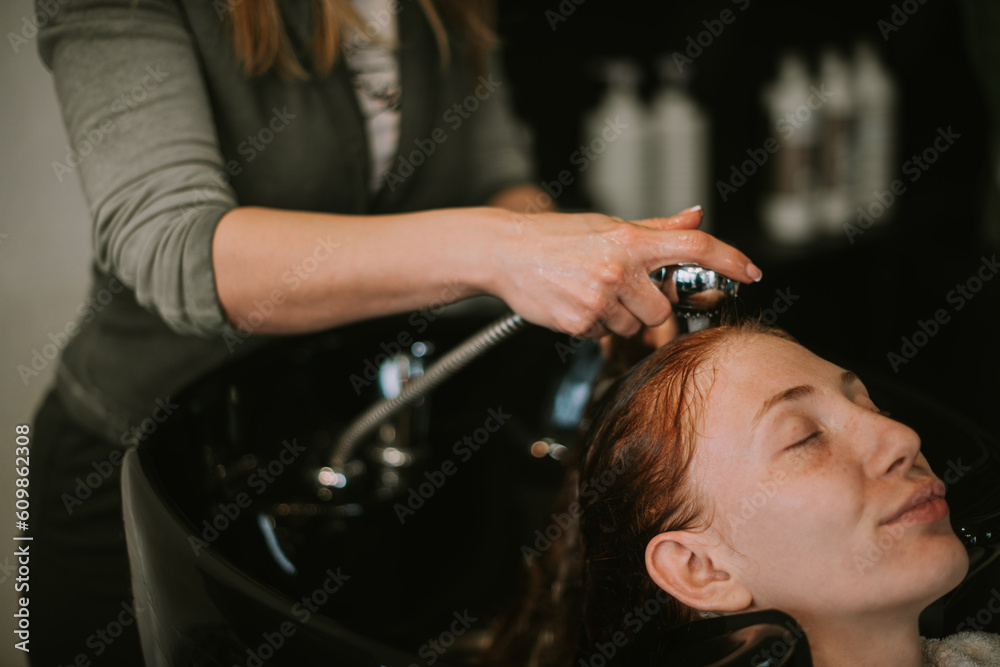 Fototapeta premium Close up of girl relaxing on the sink