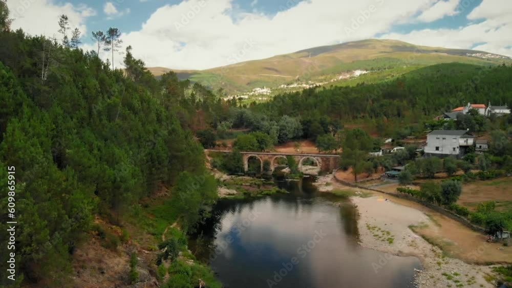 River with a Stone Bridge in a Summer Dav River with a Stone Bridge in a Summer Dav