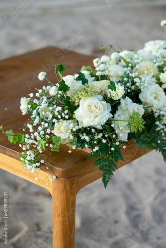 White-themed tabletop decoration concept for weddings.