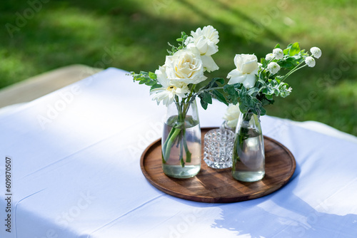 White-themed tabletop decoration concept for weddings.