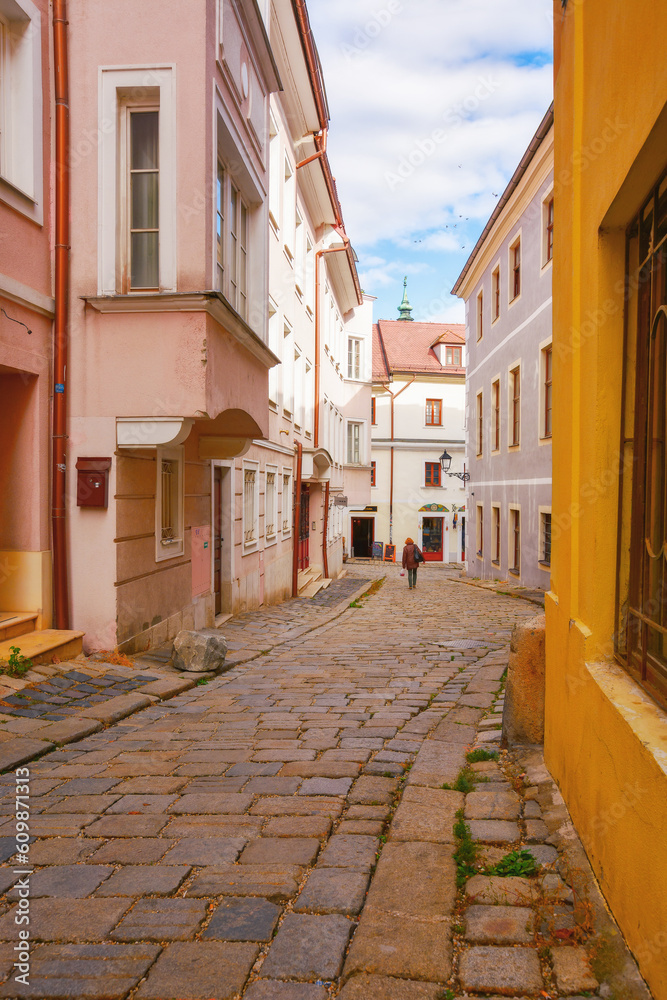 Obraz premium bratislava, slovakia - oct 16, 2019: narrow cobblestone streets of the old city. european vacations in fall season. beautiful architecture on a sunny day