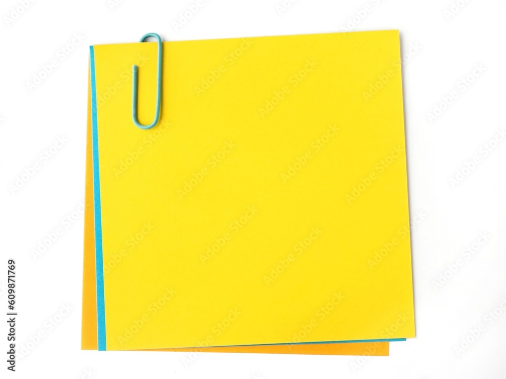 Isolated yellow memo note on a white background and copy space Isolated yellow memo note on a white background and copy space