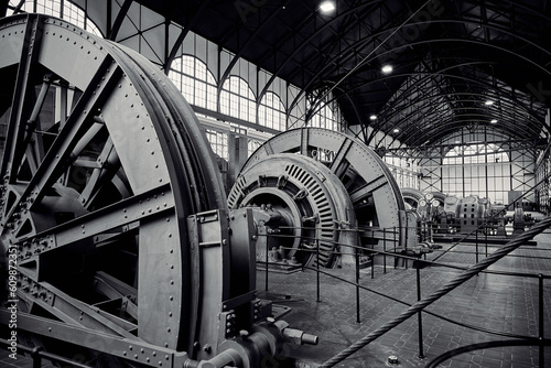 Tableau sur toile Industrial factory hall for coal mining in black and white showing big electrica