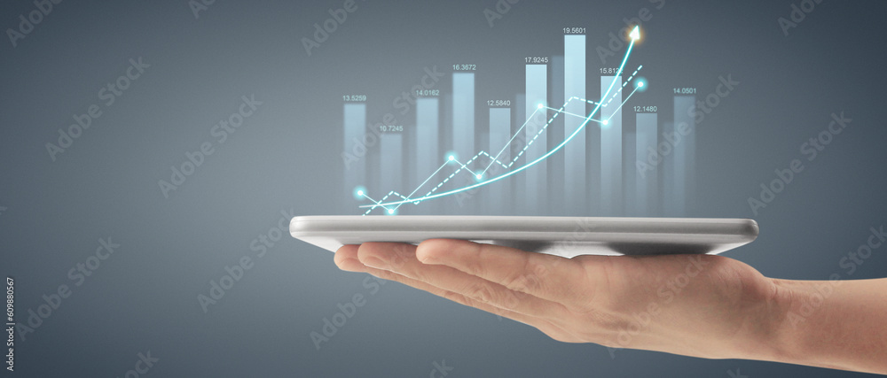 Plan graph growth and increase of chart positive indicators ,tablet in hand Plan graph growth and increase of chart positive indicators ,tablet in hand