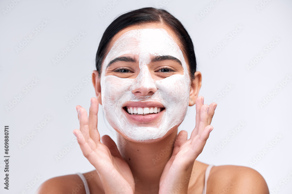 Skincare, face mask and portrait of a woman in a studio for natural, cosmetic and beauty routine. Wellness, health and female model cleaning her skin with facial cleanser isolated by white background
