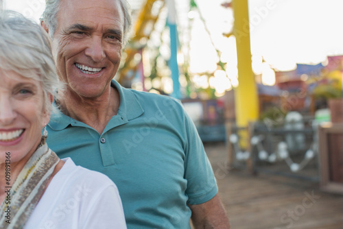 Portrait of senior couple at amusement park
